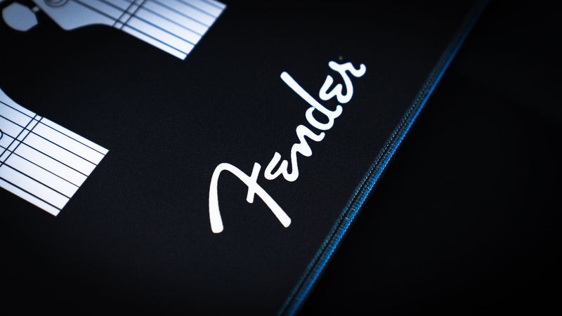 Fender Headstocks desk mat with recognizable guitar and bass headstock shapes in white