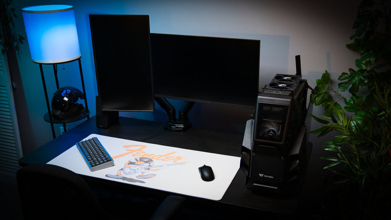 Fender Recording Machine XXL desk mat shown beneath a keyboard and mouse on a clean desktop