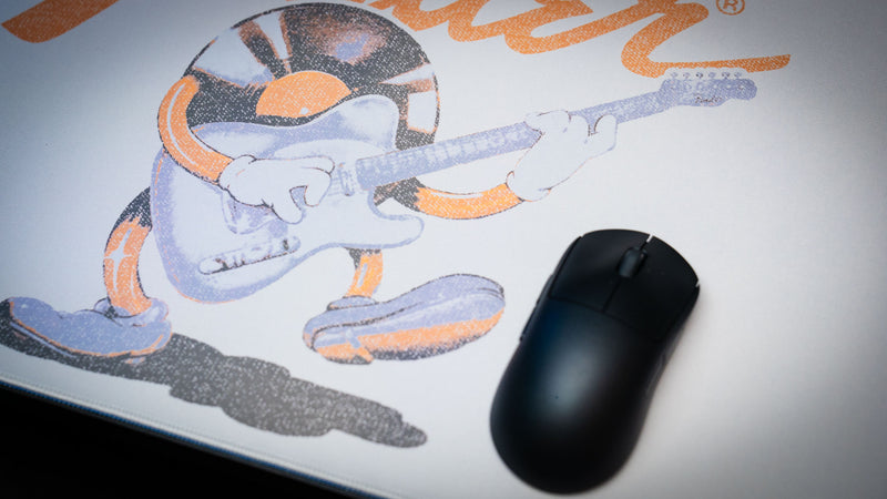 Fender Recording Machine desk mat with retro music artwork across an extended keyboard and mouse surface