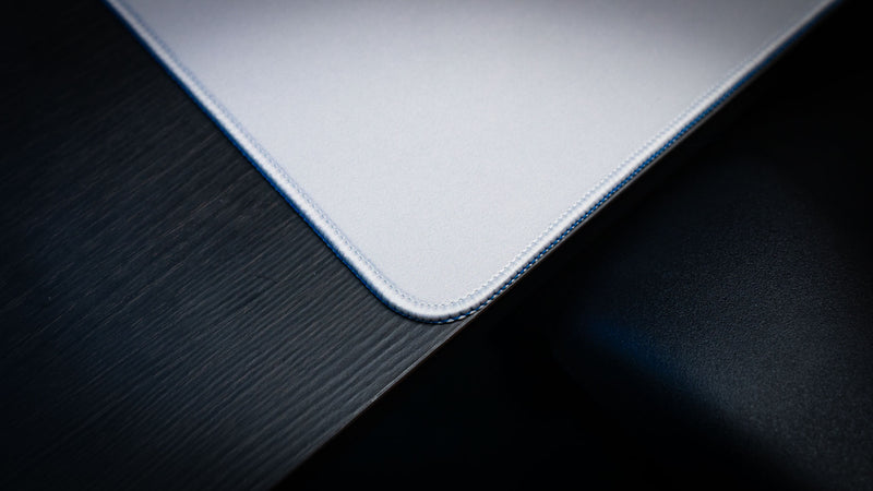 Full-desk view of the Fender Recording Machine XXL mat beneath a keyboard and mouse