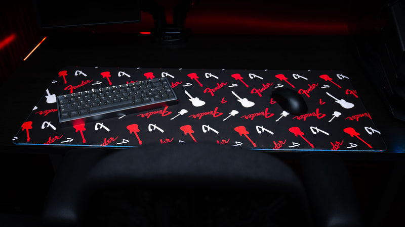 Angled view of the Fender Repeat XXL desk mat and its repeating logo pattern