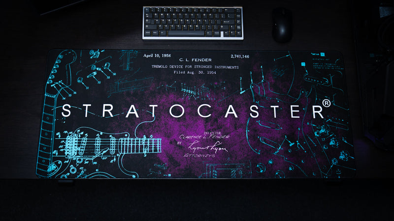 Full desk view of the purple Fender Stratocaster Blueprint desk mat with technical guitar diagrams