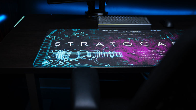 Wide view of the purple Fender Stratocaster Blueprint desk mat with engineering-style details