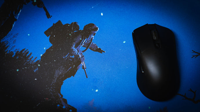 Gaming mouse moving across the dense woven surface of a Rust deskmat