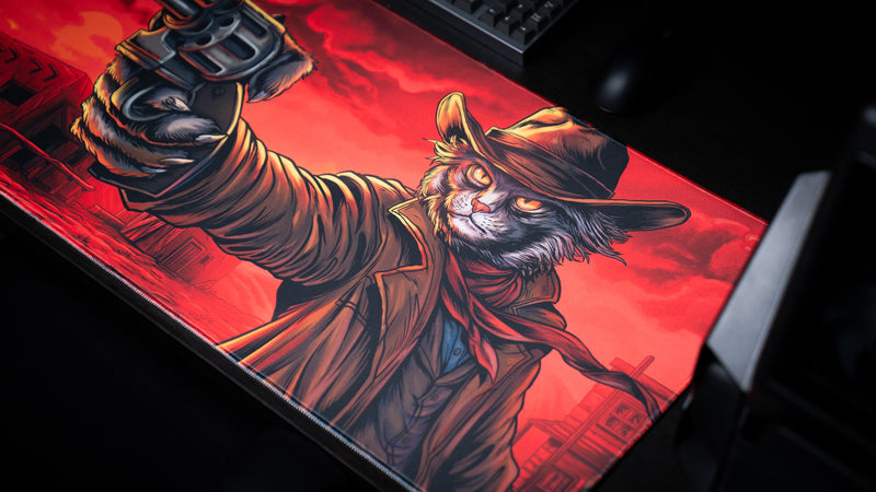 Close-up of Only PVP Cat deskmat showing the cowboy cat's hat, flowing scarf, coat, and outstretched arm.