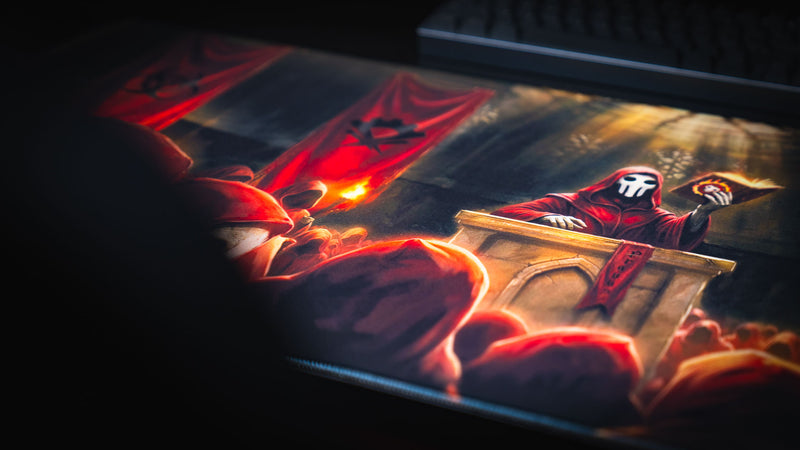 Close-up of the Pravus Crimson Convocation deskmat featuring the masked cult leader delivering a torchlit sermon to crimson-robed followers in a dark fantasy cathedral.