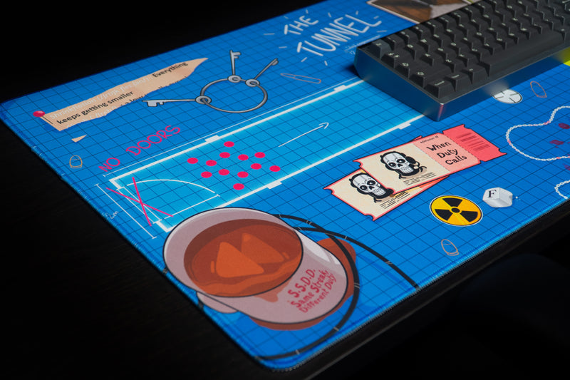 Close-up of The Tunnel deskmat artwork and smooth mouse surface