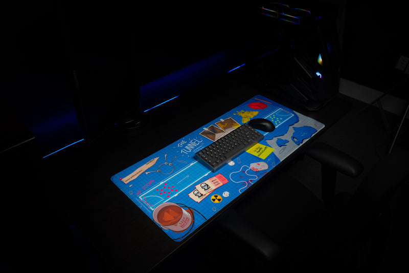 Replaymode The Tunnel deskmat in a dark desktop setup