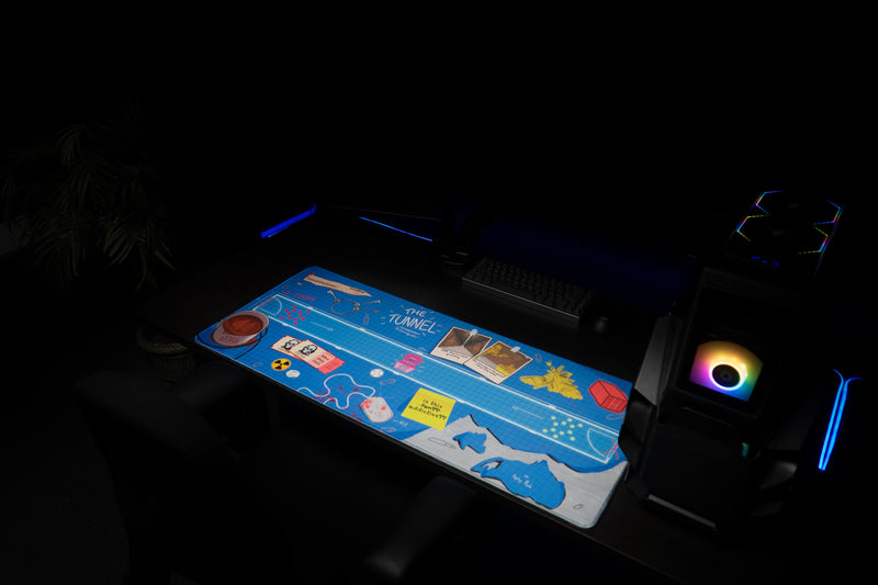 Wide view of Replaymode The Tunnel deskmat in an RGB gaming setup