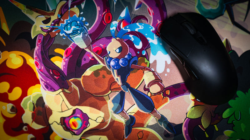 Close-up of the Sedi-mat deskmat by Pokedex Studios featuring a heroic water-themed fantasy creature battling a giant tentacled monster, showcasing vibrant colors and premium print detail.