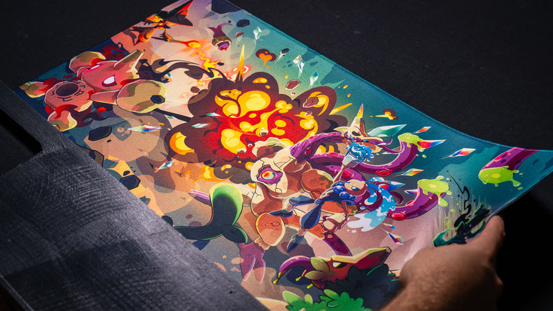 Angled view of the Sedi-mat premium TCG playmat by Pokedex Studios demonstrating its flexible construction, vivid fantasy artwork, and high-quality stitched edges.