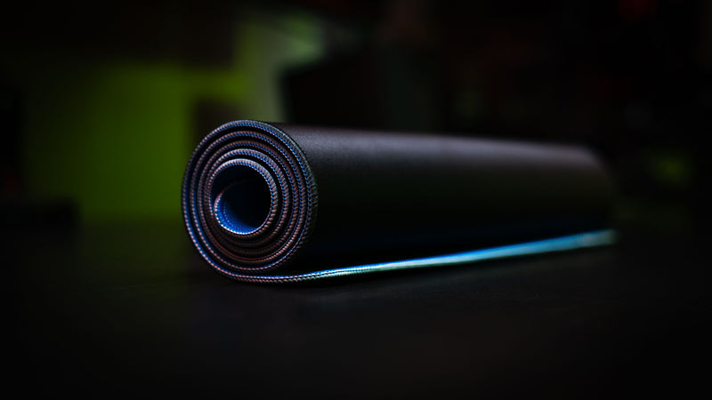 Rolled Shh Rust deskmat highlighting the premium stitched edges, smooth gaming surface, and flexible construction designed for long-lasting durability and comfort.