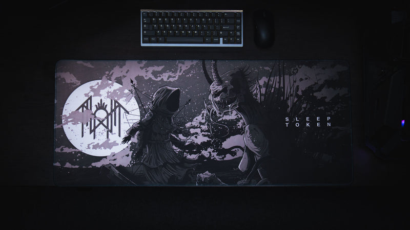 Overhead view of The Battle Sleep Token deskmat showing the hooded figure, horned creature and moon sigil
