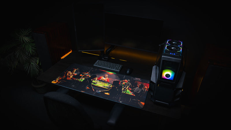 Sleight of Hand Rust gaming deskmat displayed on an RGB gaming setup featuring survivors gathered around a poker table inside a dimly lit cabin.