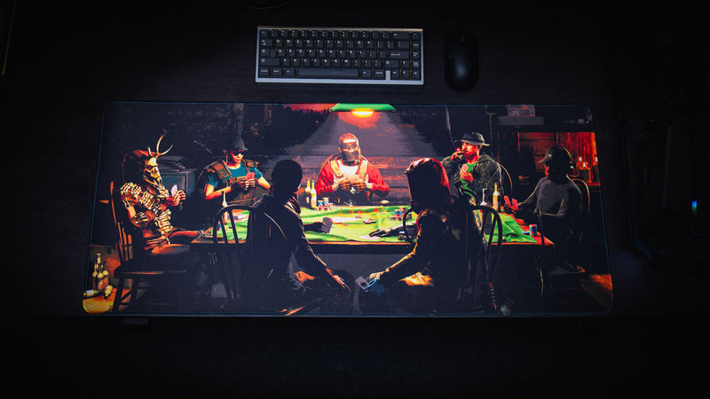 Top-down view of the Sleight of Hand Rust gaming deskmat featuring survivors gathered around a poker table inside a dimly lit cabin.