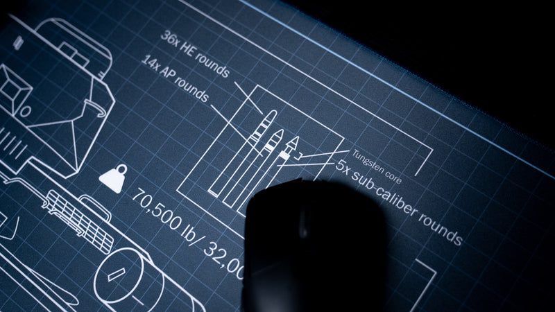Close-up of the Jimarkus T-34 Schematic deskmat highlighting detailed ammunition diagrams, blueprint annotations, and precision-printed technical artwork beside a gaming mouse.