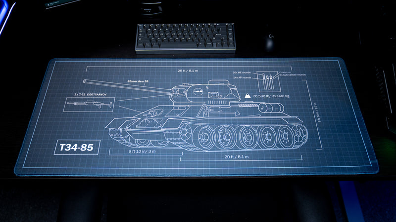 Jimarkus T-34 Schematic deskmat displayed across a desktop setup, featuring a detailed T-34-85 tank blueprint with technical specifications and measurements.