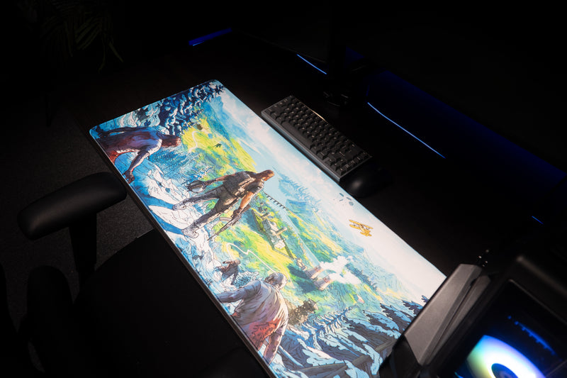 Left angled view of the Dead Horizon desk mat showing the survivor and snowy landscape on a gaming desk.