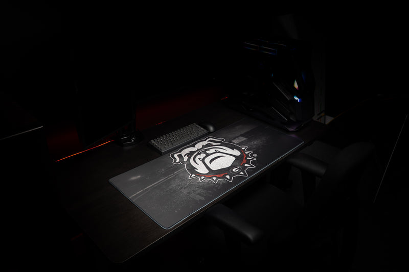 Angled view of the Georgia Bulldogs Home Turf deskmat across a gaming desk.