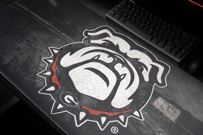 Close-up of the white bulldog mascot on the Georgia Bulldogs Home Turf deskmat.