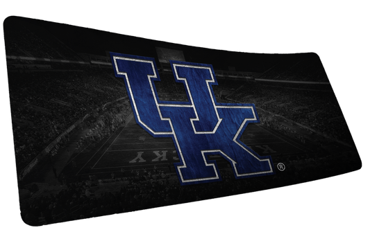 University of Kentucky Home Turf deskmat with blue UK logo over a dark stadium background.