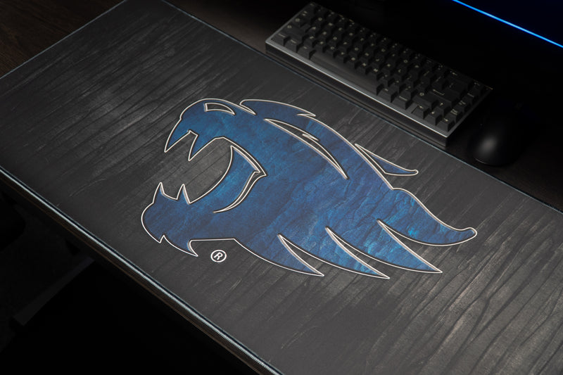 Close-up of the blue wildcat head on the Kentucky Mark of the Wildcat deskmat.