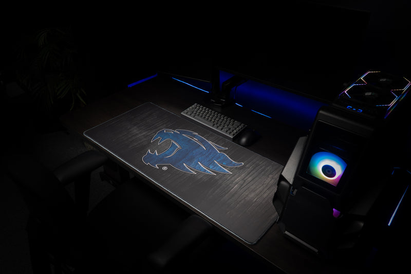 Kentucky Mark of the Wildcat deskmat across a gaming workstation.