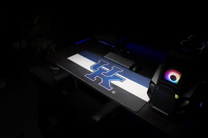 Angled view of the Kentucky Pride deskmat on a gaming desk with blue, white, and black stripes.