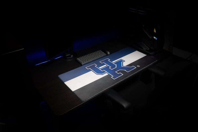 Kentucky Pride deskmat spread across a dark workstation with the blue UK logo visible.