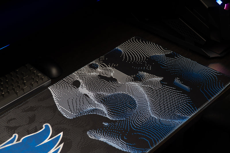 Detail of the abstract wildcat artwork on the Kentucky Wildcat Soundwave deskmat.