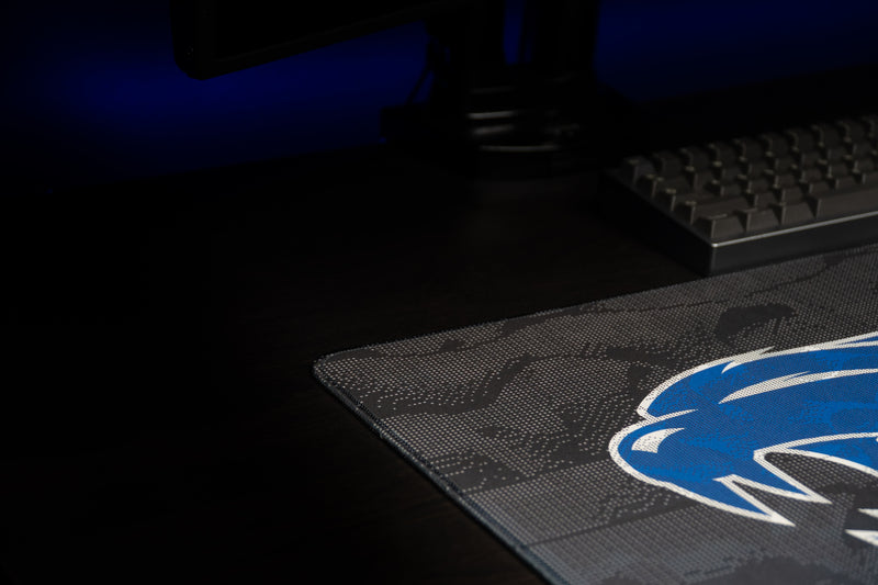 Close-up of the blue wildcat head on the Kentucky Wildcat Soundwave deskmat.