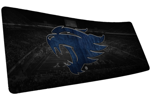 University of Kentucky Wild Cat's Home Turf deskmat with blue wildcat head over a dark stadium background.