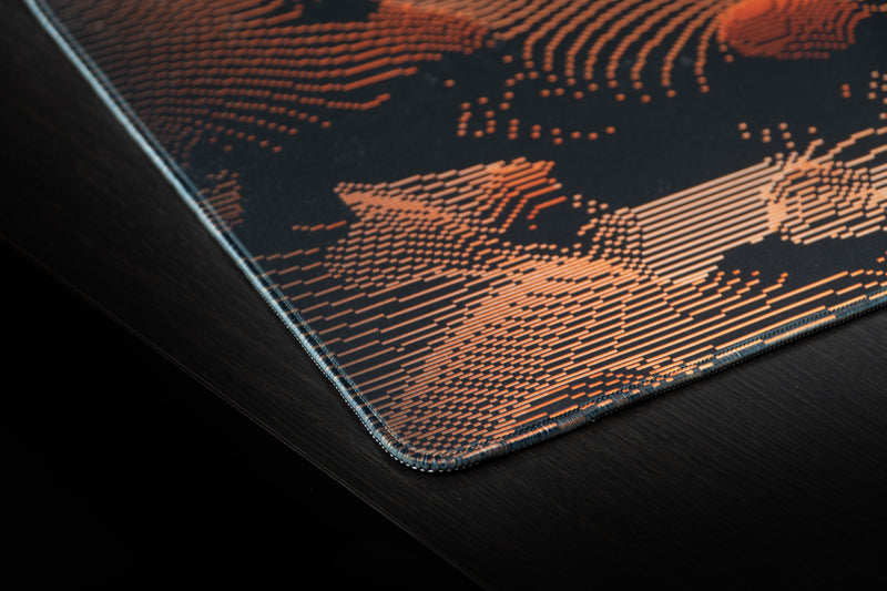 University of Miami Etched Storm deskmat close-up of orange contour lines and the stitched corner