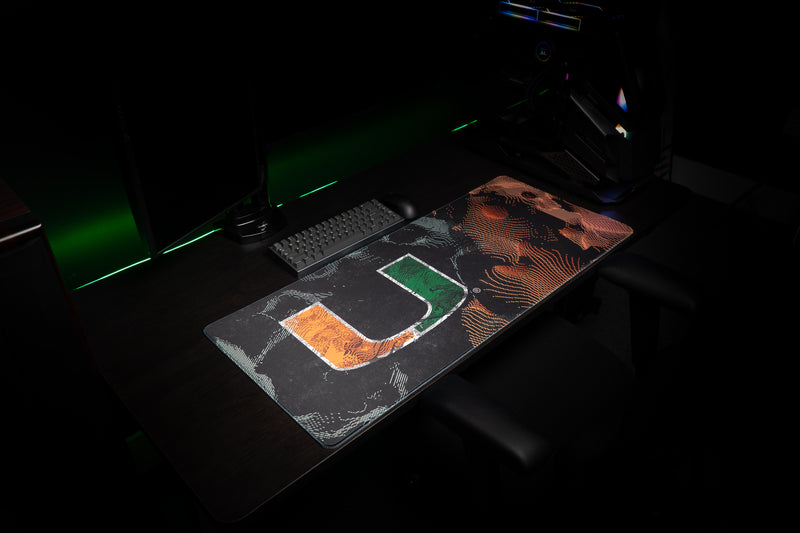 University of Miami Hurricane Static deskmat side angled view of the U and orange static lines