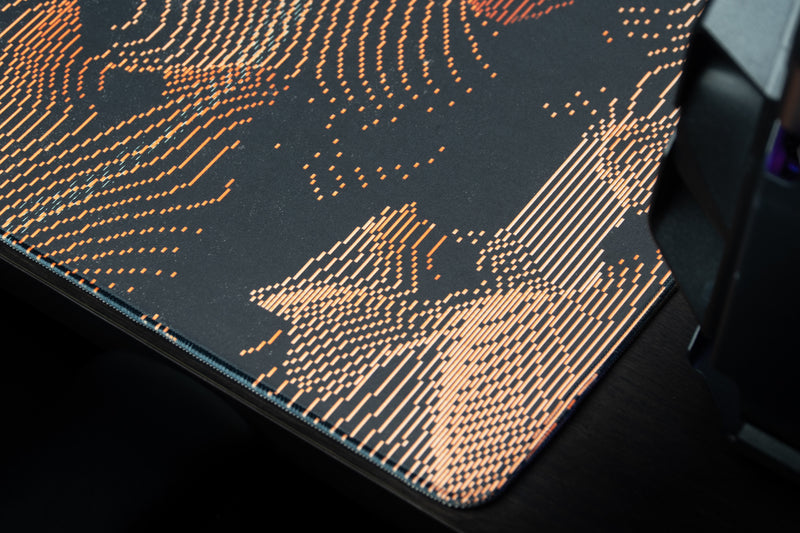 University of Miami Hurricane Static deskmat close-up of orange static lines and the stitched corner