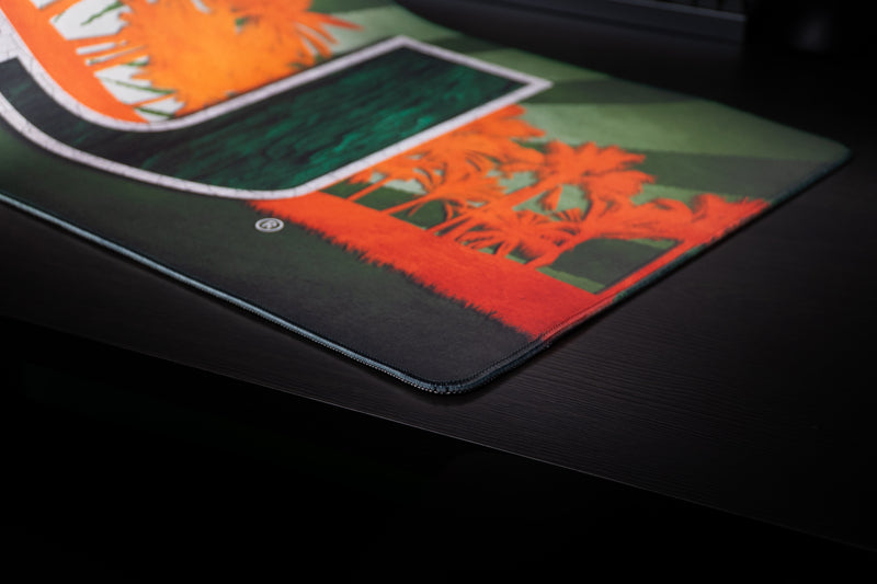 University of Miami Paradise deskmat close-up of the stitched corner and orange palm tree design