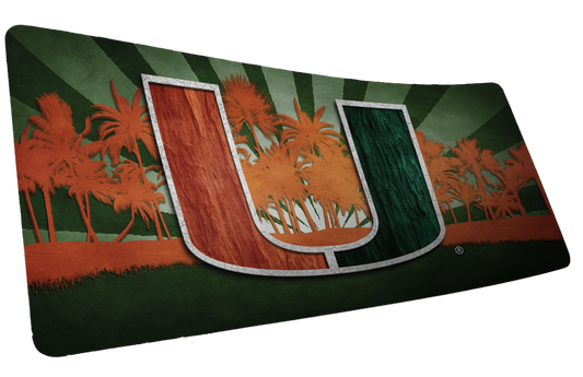 University of Miami Paradise deskmat mockup of the orange-and-green U with orange palm trees and green rays