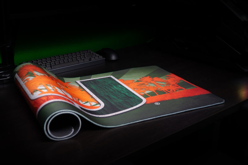 University of Miami Paradise deskmat alternate close-up of the rolled deskmat edge and tropical U artwork