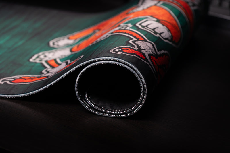 University of Miami Sebastian's Mark deskmat close-up of Sebastian's claws and the rolled stitched edge