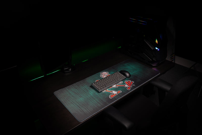 University of Miami Sebastian's Mark deskmat angled view with keyboard and mouse on the Sebastian deskmat