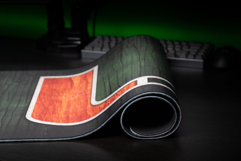 University of Miami The U deskmat close-up of the rolled edge and orange half of the U