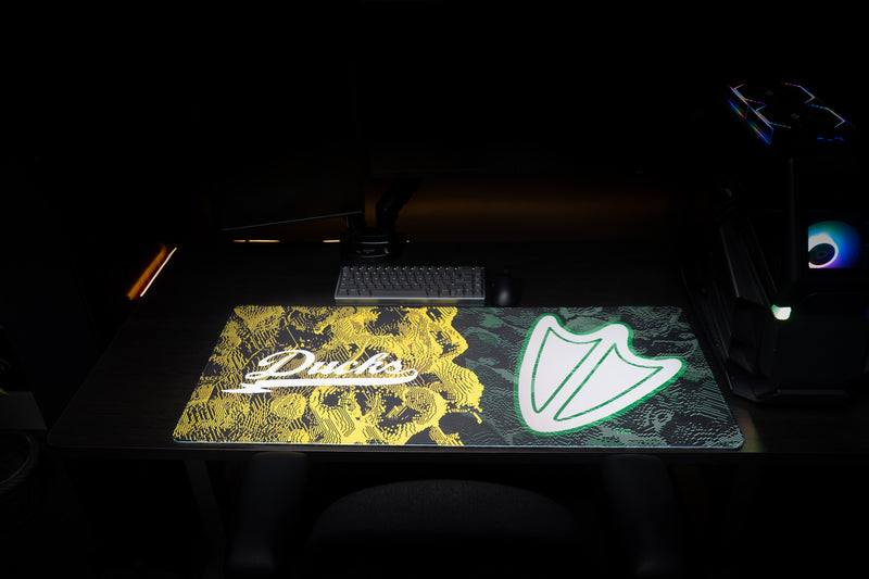 Front view of the Oregon Emerald Signature deskmat with Ducks script and webbed-foot emblem.