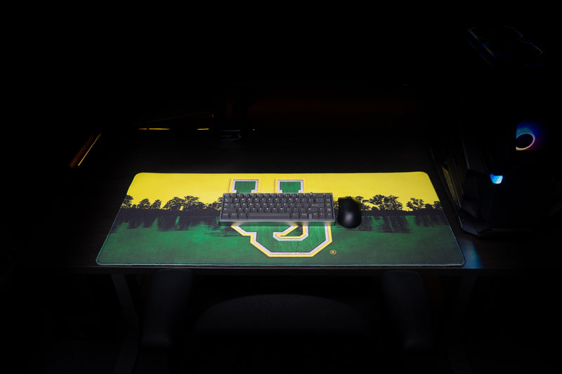Keyboard and mouse on the Oregon Horizon in Green deskmat with lakeside design.