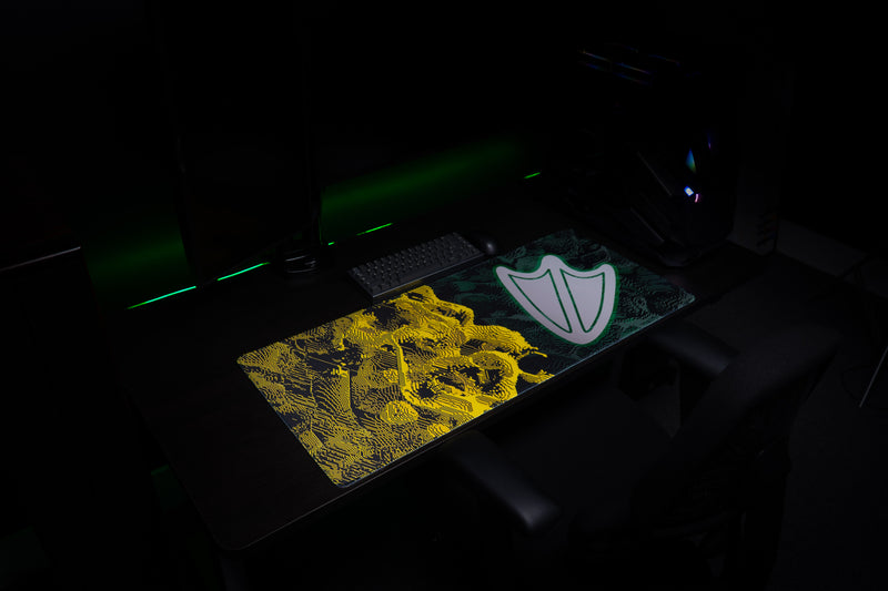 Wide view of the Oregon Flux deskmat on a gaming desk.