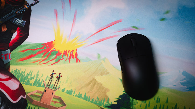 Willy and his Horse gaming deskmat with a gaming mouse, showcasing the smooth tracking surface, vibrant landscape artwork, and premium extended mousepad design.