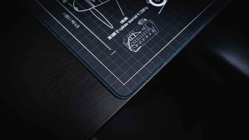 Close-up of the stitched edge and premium fabric surface on the Wings of Steel BF 109 G-6 blueprint gaming deskmat, highlighting durable craftsmanship and precision printing.