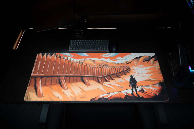 Zodec's Great Wall of Chernarus XL desk mat on a dark desk setup, with a mechanical keyboard, black mouse and monitor behind it
