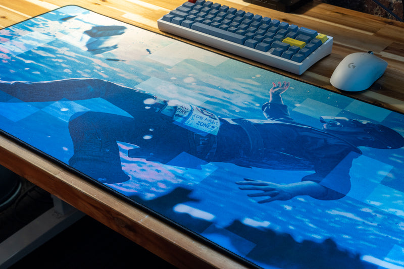 "Motion" — Rust Deskmat