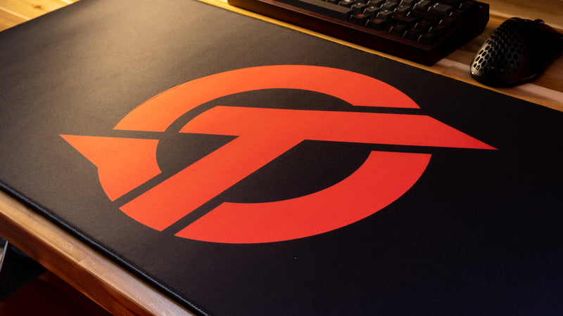 "OT" — Rust Deskmat