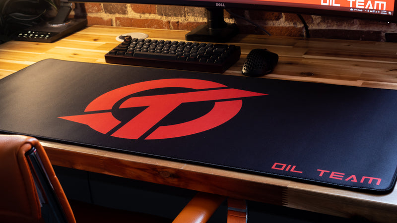 "OT" — Rust Deskmat
